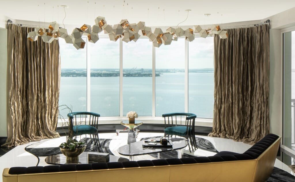 Architectural statement lighting defining a luxury interior by Rob Bowen Design Group