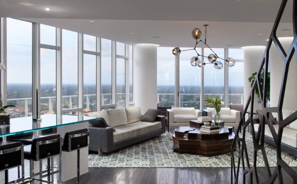 Modern sculptural chandelier in a luxury living room by Rob Bowen Design Group